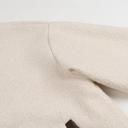 Beige wool jacket with bow