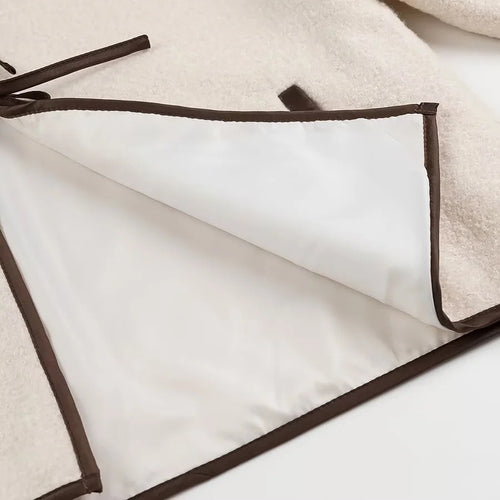 Beige wool jacket with bow