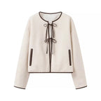 Beige wool jacket with bow